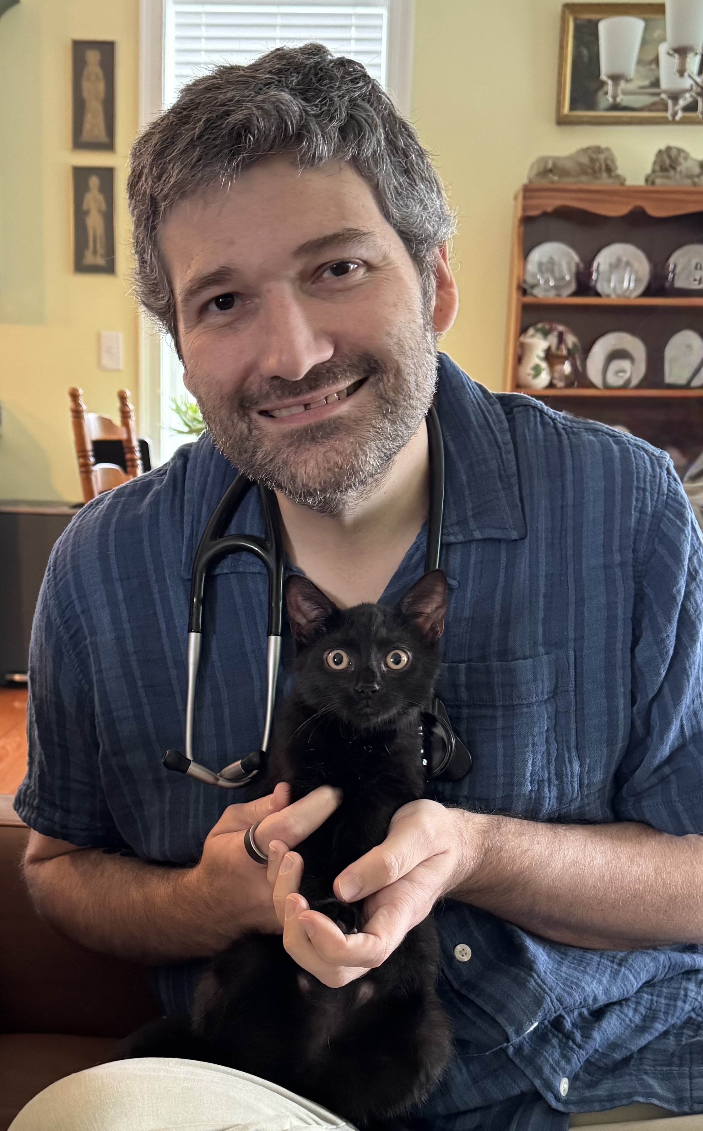 Adam Page, DVM with a kitten
